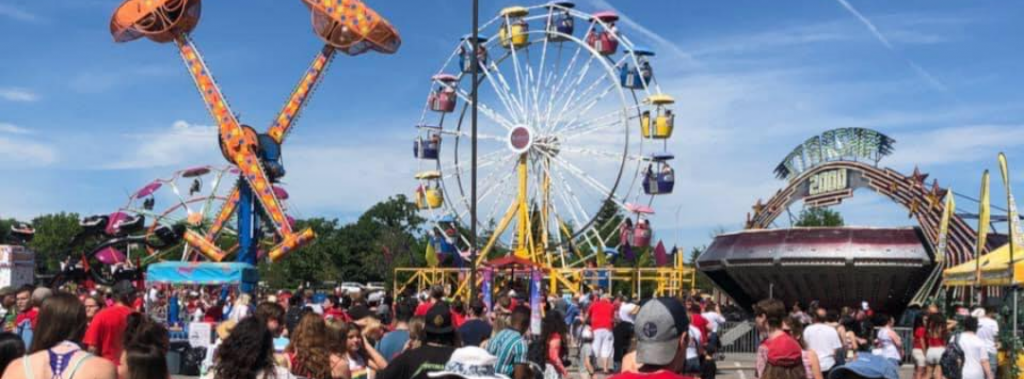 summer fair with ferris wheel