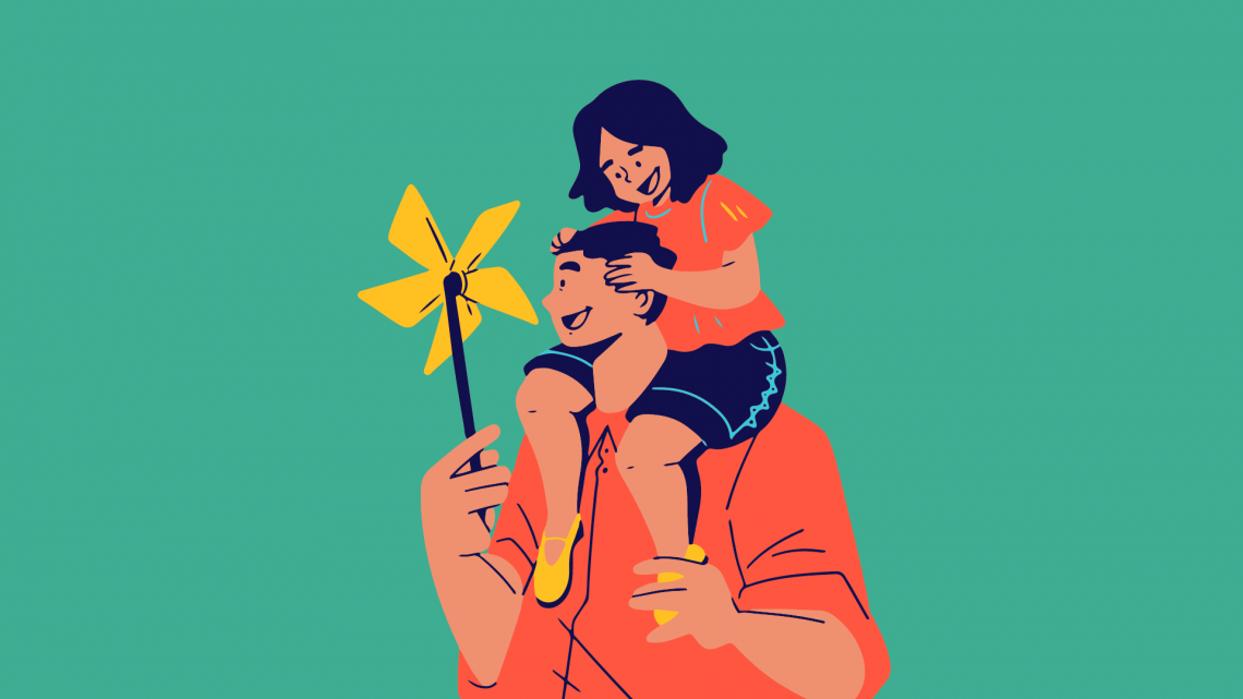 daughter on dad's shoulders, both smiling